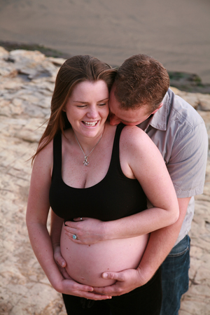 bigstockphoto_happy_dad_to_be_kissing_wife_1253793.jpg